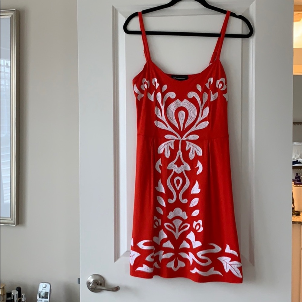 Red jersey dress with embroidered detail